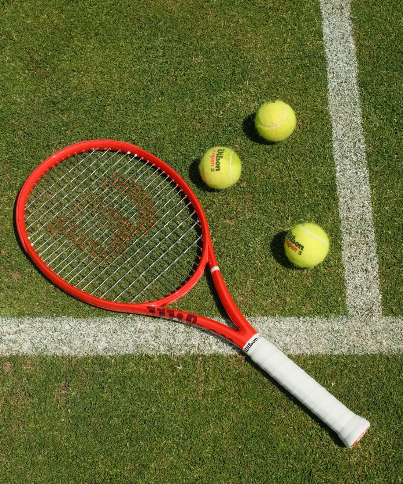 Wilson racket and tennis balls